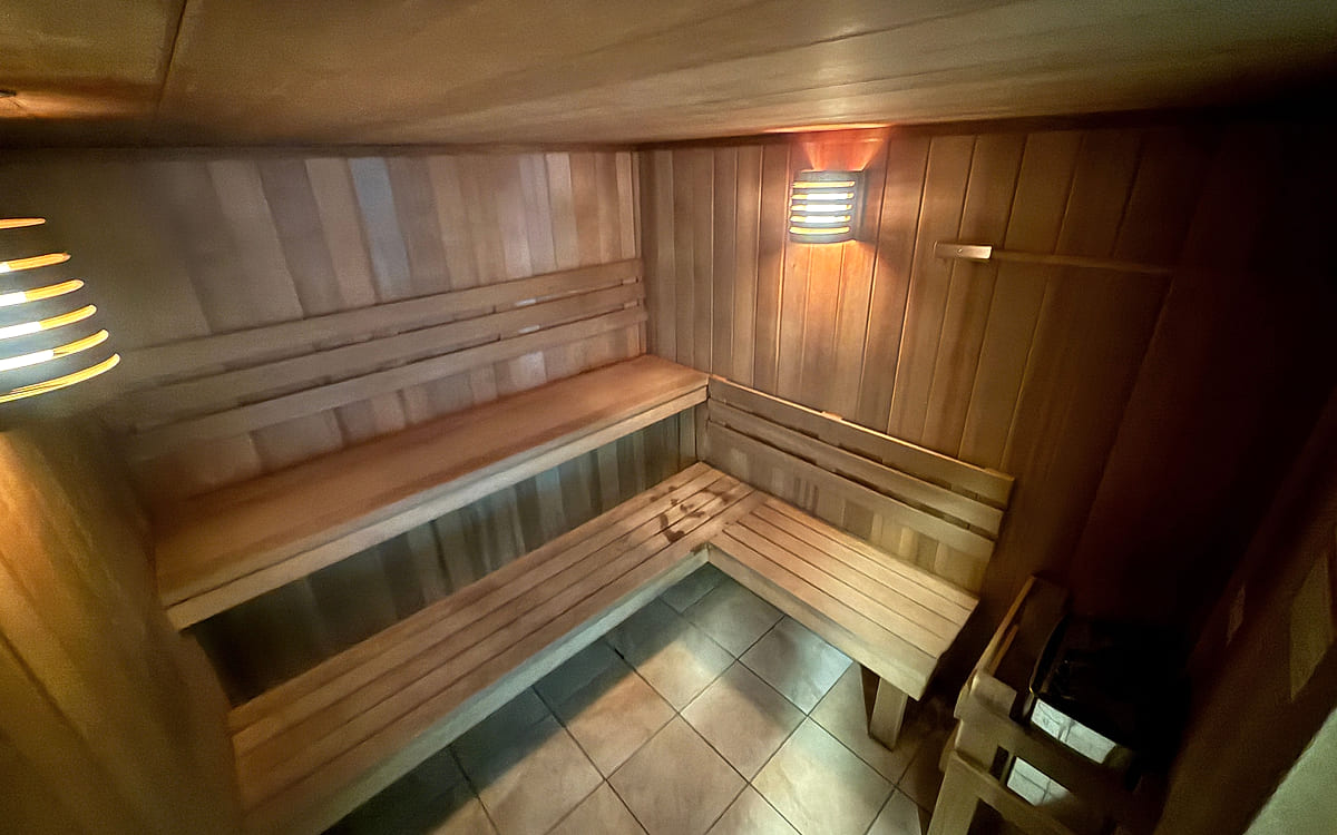 Benches inside the cedar sauna at ONE Boulder Fitness