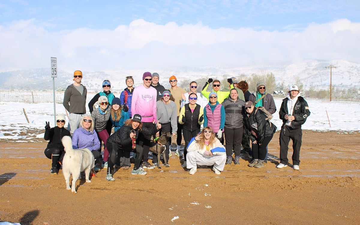 ONE Boulder Fitness members gathered outside in the snow
