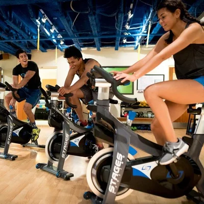 Members riding together in the cycling studio