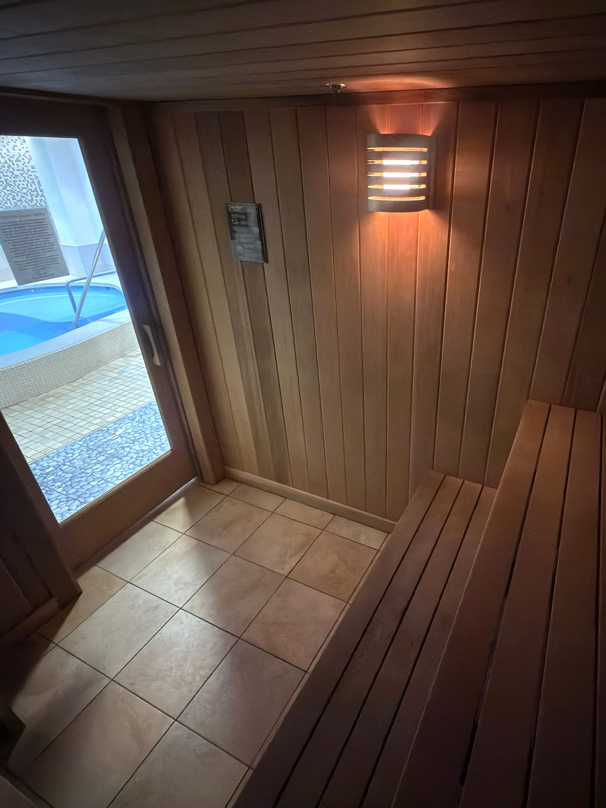 Inside the cedar sauna, looking through the door to the Cool Tub a few steps away